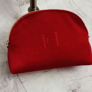 Carolina Herrera Vibrant Red Cosmetic Bag with samples